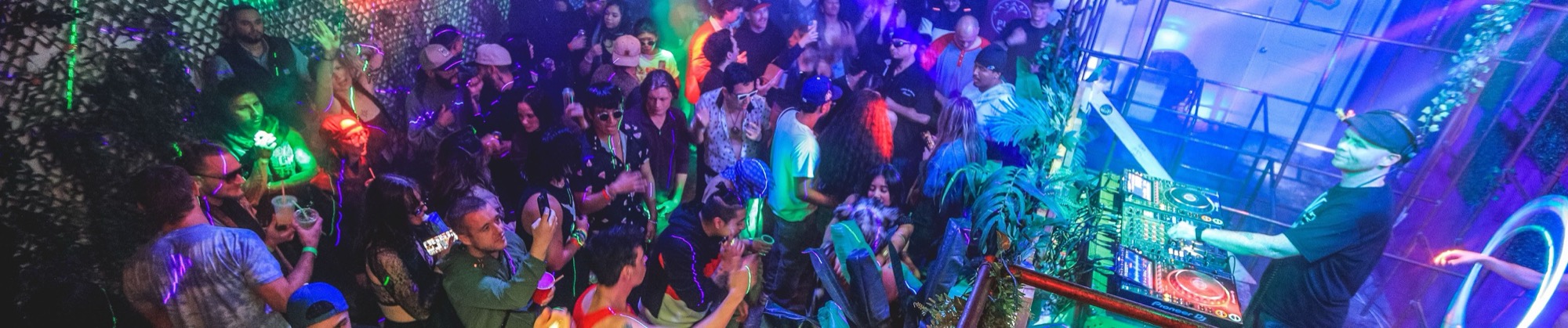 Bill Plur at the decks, playing to a packed dance floor
